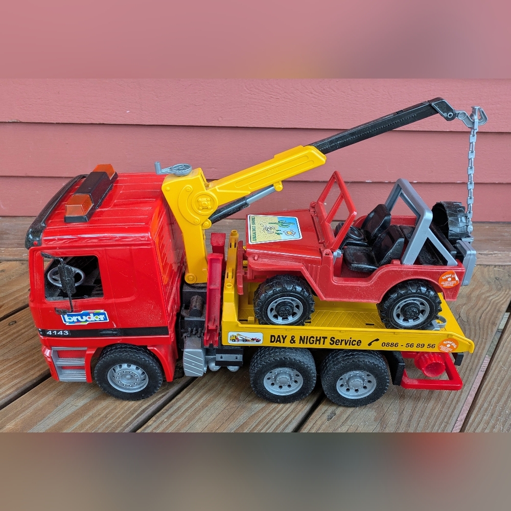 Bruder Red and Yellow Tow Truck with Jeep